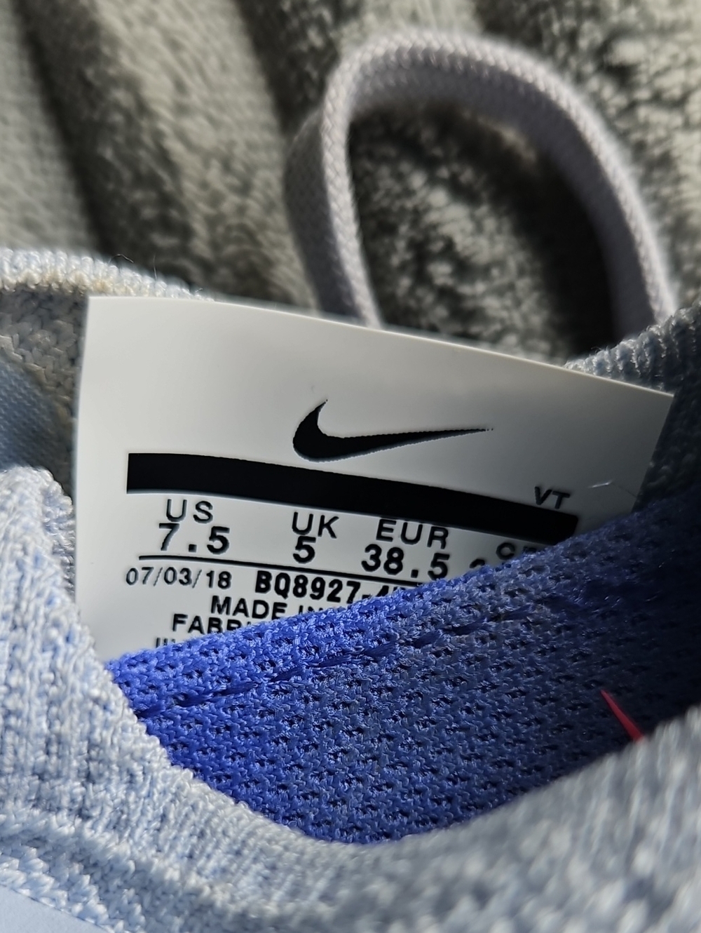 Nike Women's Epic React Flyknit Sneakers with Coral Highlights - Picture 7 of 7